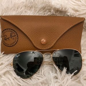 Black and gold raybans